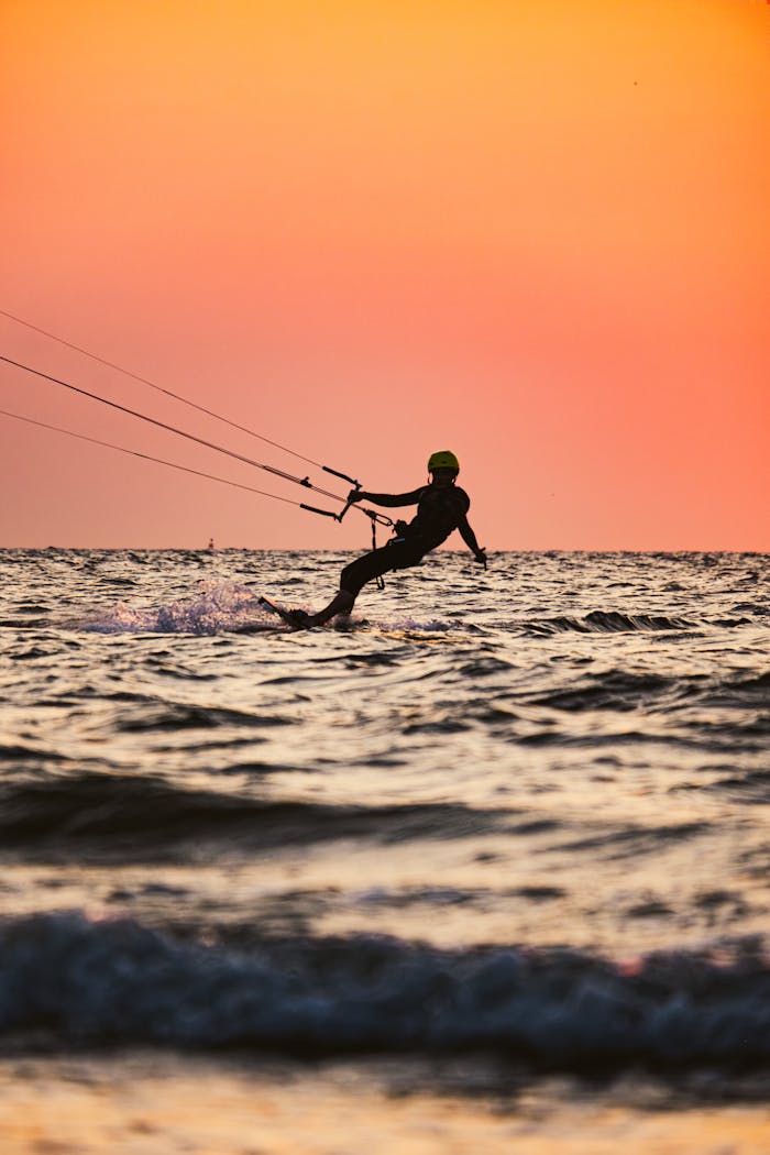 Kitesurfing during sunset